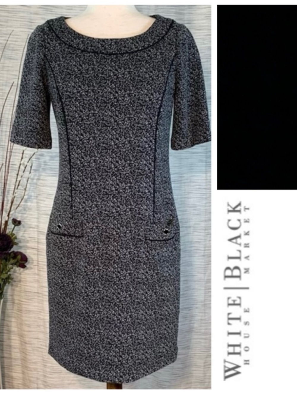 White House Black Market black and white tweed style short sleeve sheath dress.